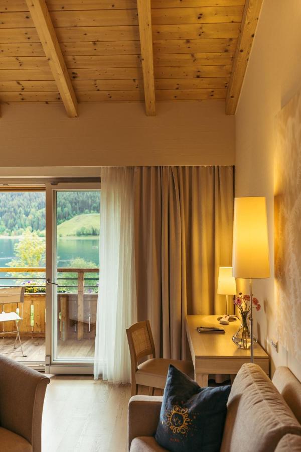 Strandhotel Am Weissensee Bagian luar foto