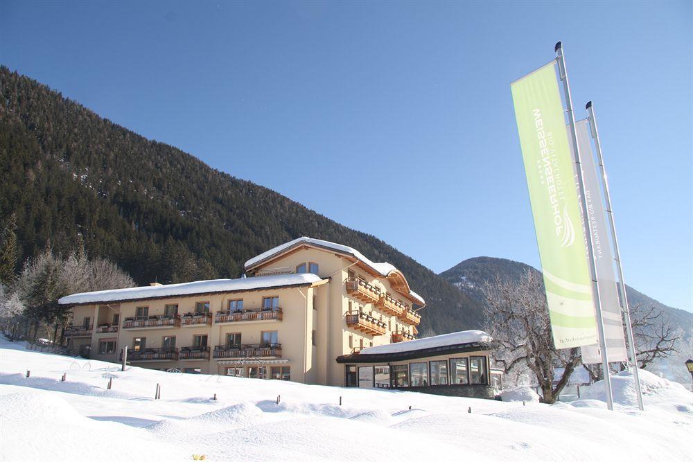 Strandhotel Am Weissensee Bagian luar foto