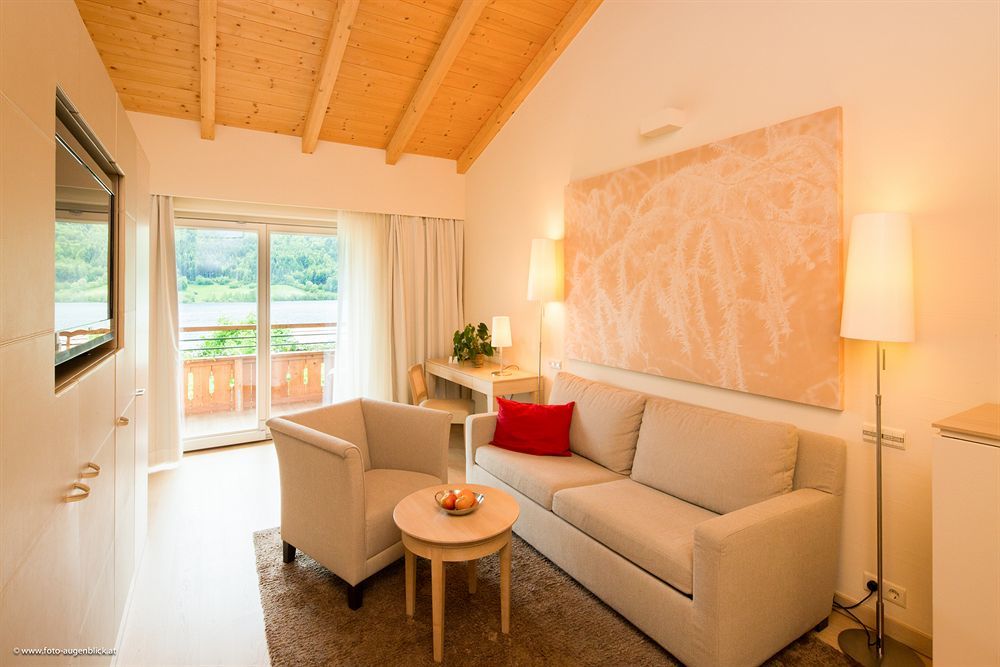 Strandhotel Am Weissensee Bagian luar foto